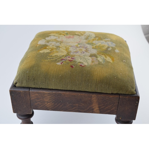 428 - An antique footstool with tapestry decoration to top. Height 23cm.