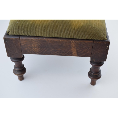 428 - An antique footstool with tapestry decoration to top. Height 23cm.