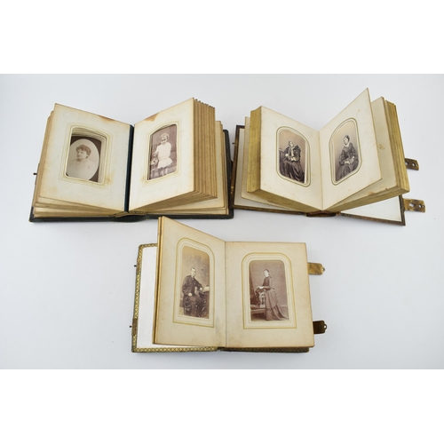 439 - A collection of Victorian photograph albums with contents, leather bound with brass fittings. Period... 