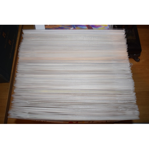 441 - A collection of 2000 AD comics. All issues are housed in card backed cellophane storage sleeves. (Qt... 