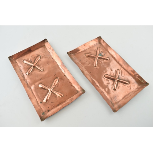 452 - A pair of copper Arts and Crafts rectangular trays with embossed design and raised edges, 19.5cm x 1... 