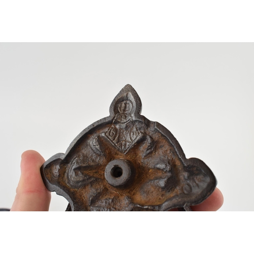 455 - A Kenrick and Sons or similar door knocker together with a ceramic Victorian door knob. (2) 23cm.