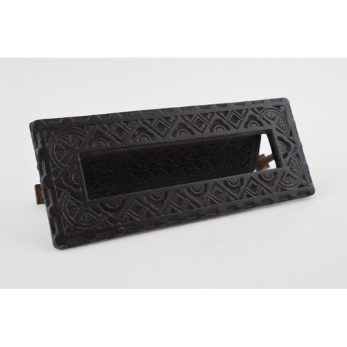 456 - A cast iron letter box with flower motif marked Kenrick & Sons No. 6 to reverse. 19cm.