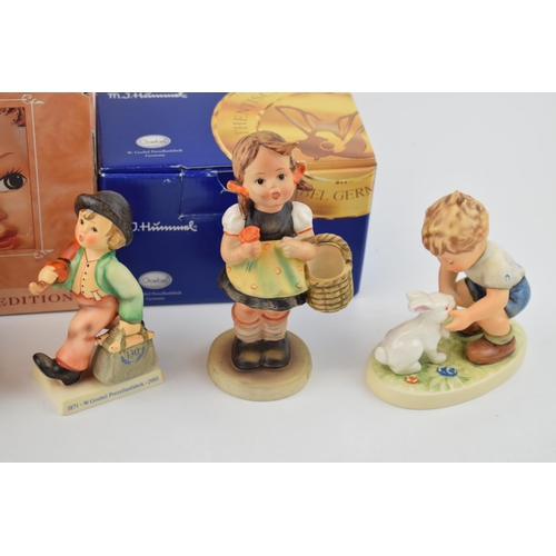 104 - A collection of Goebel figures to include Sister, Private Conversation, Merry Wanderer (boxed), Scho... 