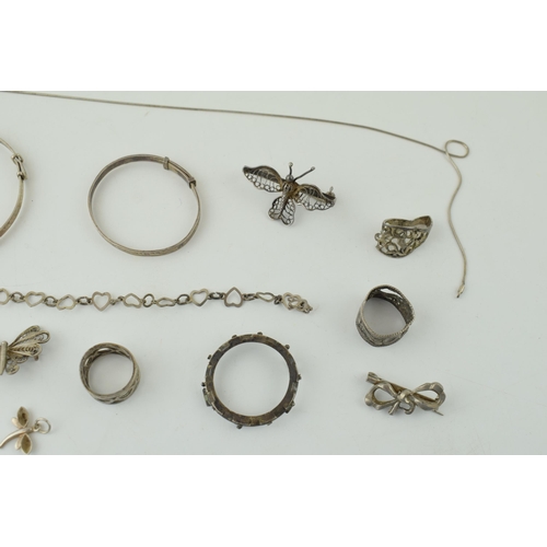 305A - A collection of vintage silver and costume jewellery to include bangles, brooches and rings. (Qty)