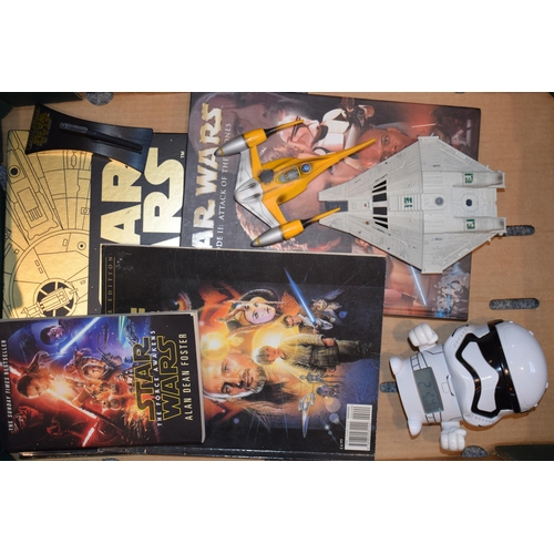 442 - A collection of Stars Wars collectables and ephemera to include books and publications together with... 