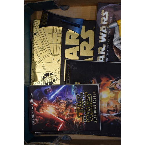 442 - A collection of Stars Wars collectables and ephemera to include books and publications together with... 