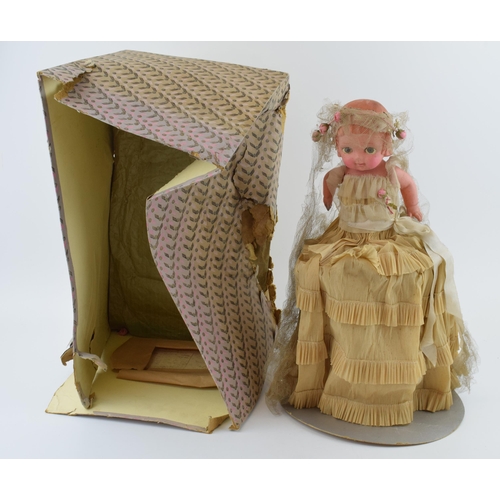 465 - Boxed doll with paper dress, made in England, 'Pomeranian'. Height 40cm.