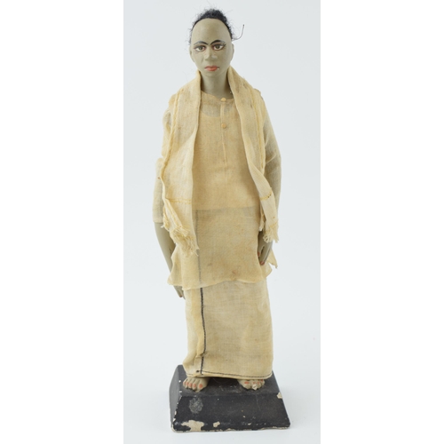 467 - Pottery figure of a standing man Possibly a souvenir piece. Height 28cm