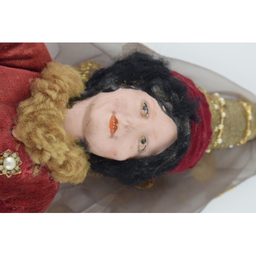 468 - English doll, ceramic head likely manufactured in Stoke on Trent, c1930s. Red dress Chaucer's Tales.... 