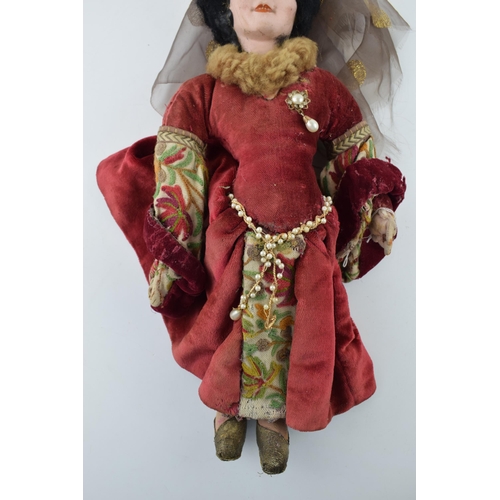 468 - English doll, ceramic head likely manufactured in Stoke on Trent, c1930s. Red dress Chaucer's Tales.... 