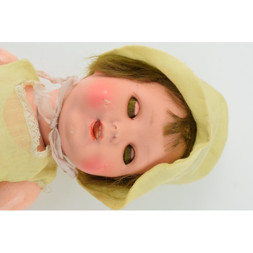 470 - Bisque head doll 170 3/0 Made in Germany. Teeth present. Height 36cm.