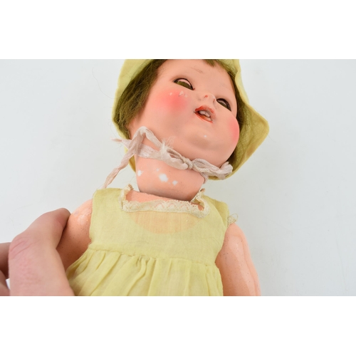 470 - Bisque head doll 170 3/0 Made in Germany. Teeth present. Height 36cm.