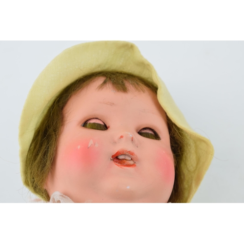 470 - Bisque head doll 170 3/0 Made in Germany. Teeth present. Height 36cm.