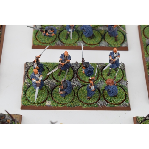 485 - A collection of cast metal and plastic war-games and miniature figures by 'Games Workshop' from the ... 