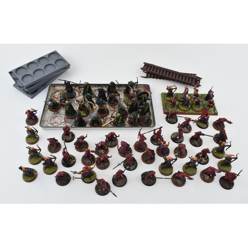 486 - A collection of cast metal and plastic war-games and miniature figures by 'Games Workshop' from the ... 