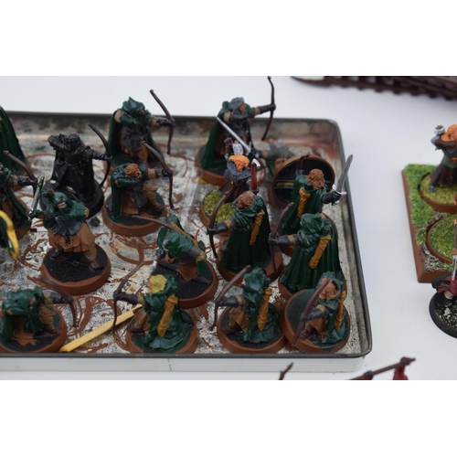 486 - A collection of cast metal and plastic war-games and miniature figures by 'Games Workshop' from the ... 