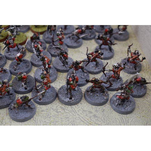 487 - A collection of cast metal and plastic war-games and miniature figures by 'Games Workshop' from the ... 