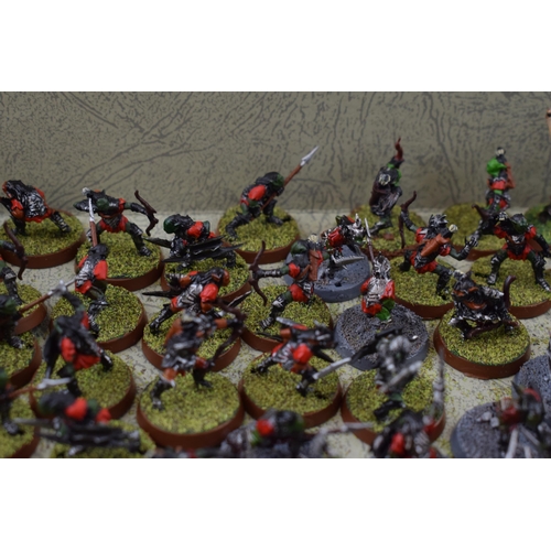 487 - A collection of cast metal and plastic war-games and miniature figures by 'Games Workshop' from the ... 