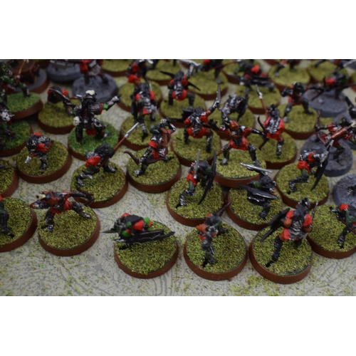 487 - A collection of cast metal and plastic war-games and miniature figures by 'Games Workshop' from the ... 