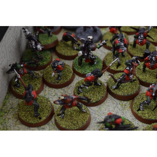 487 - A collection of cast metal and plastic war-games and miniature figures by 'Games Workshop' from the ... 