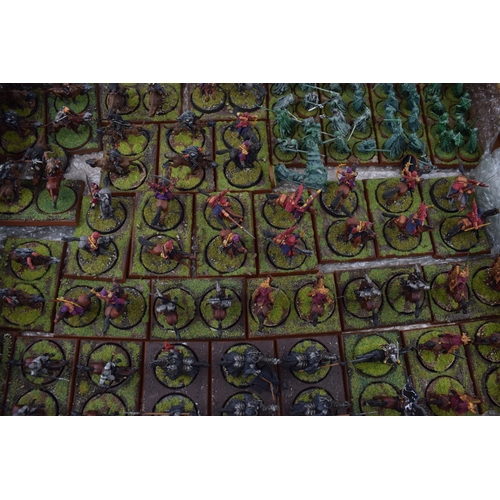 489 - A collection of cast metal and plastic war-games and miniature figures by 'Games Workshop' from the ... 