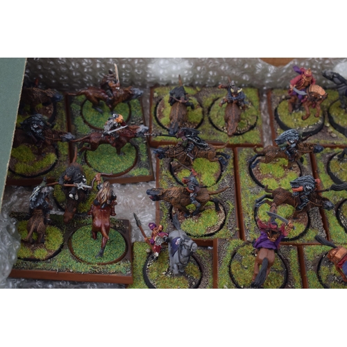 489 - A collection of cast metal and plastic war-games and miniature figures by 'Games Workshop' from the ... 