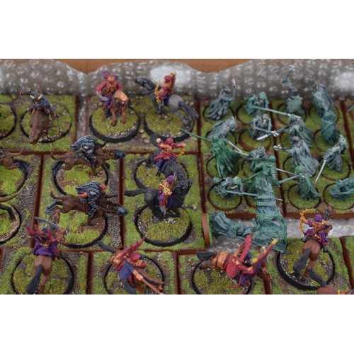 489 - A collection of cast metal and plastic war-games and miniature figures by 'Games Workshop' from the ... 