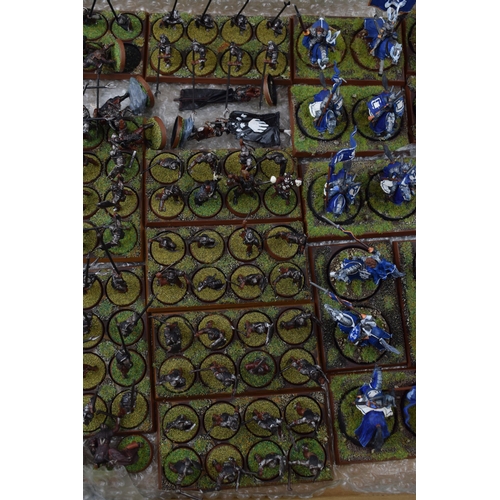 490 - A collection of cast metal and plastic war-games and miniature figures by 'Games Workshop' from the ... 