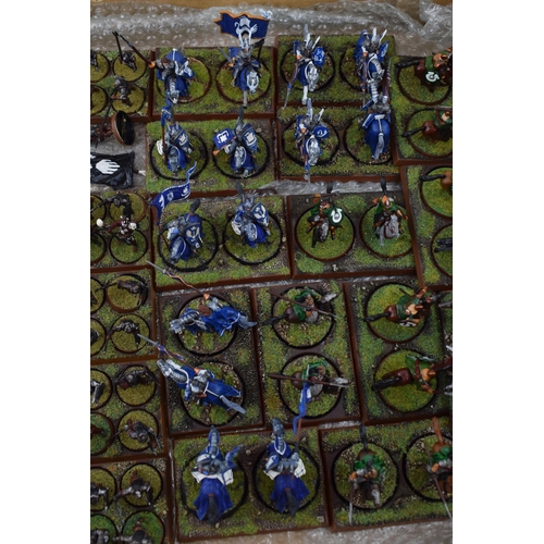 490 - A collection of cast metal and plastic war-games and miniature figures by 'Games Workshop' from the ... 