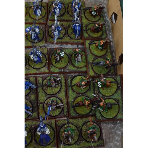 490 - A collection of cast metal and plastic war-games and miniature figures by 'Games Workshop' from the ... 