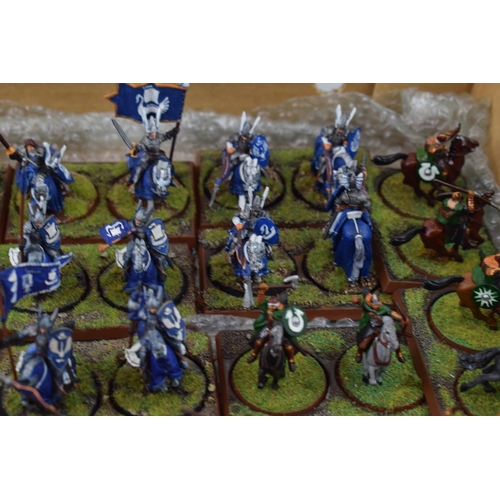 490 - A collection of cast metal and plastic war-games and miniature figures by 'Games Workshop' from the ... 