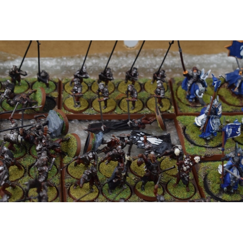 490 - A collection of cast metal and plastic war-games and miniature figures by 'Games Workshop' from the ... 