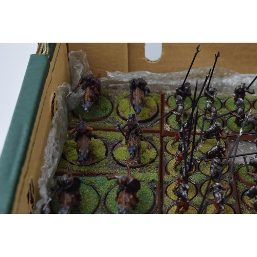 490 - A collection of cast metal and plastic war-games and miniature figures by 'Games Workshop' from the ... 