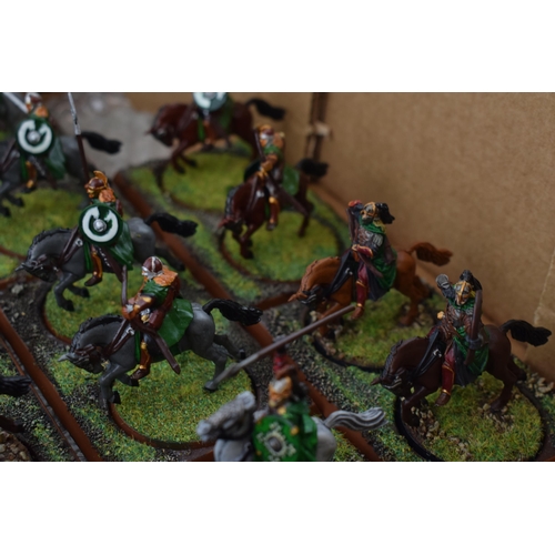 491 - A collection of cast metal war-games and miniature figures by 'Games Workshop' from the 'Lord of The... 