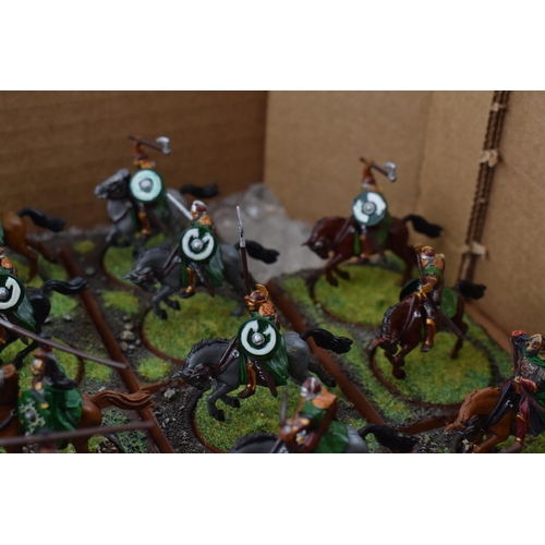 491 - A collection of cast metal war-games and miniature figures by 'Games Workshop' from the 'Lord of The... 