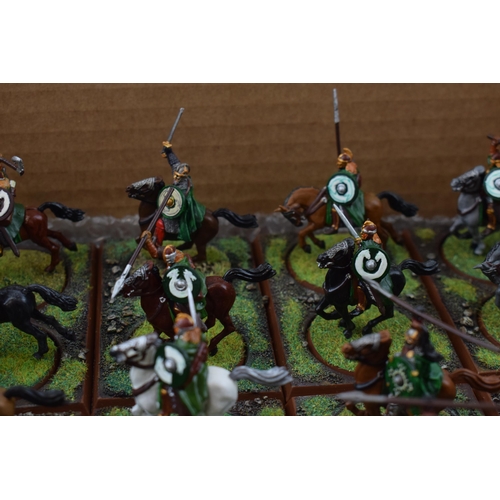 491 - A collection of cast metal war-games and miniature figures by 'Games Workshop' from the 'Lord of The... 