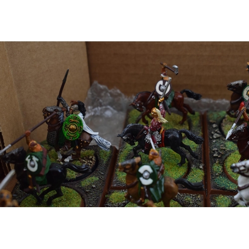 491 - A collection of cast metal war-games and miniature figures by 'Games Workshop' from the 'Lord of The... 