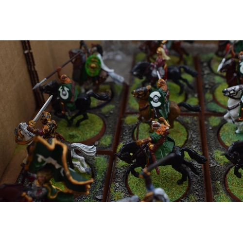 491 - A collection of cast metal war-games and miniature figures by 'Games Workshop' from the 'Lord of The... 