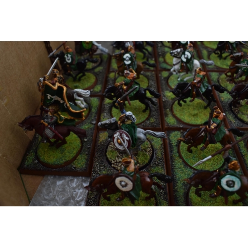 491 - A collection of cast metal war-games and miniature figures by 'Games Workshop' from the 'Lord of The... 