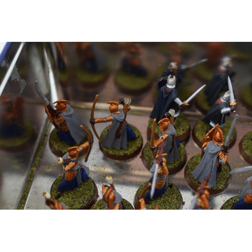 493 - A collection of cast metal war-games and miniature figures by 'Games Workshop' from the 'Lord of The... 