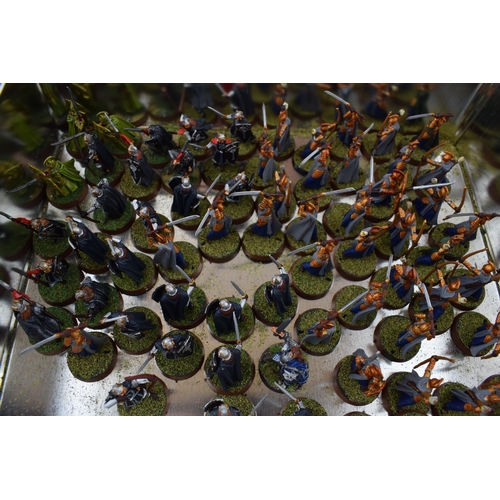 493 - A collection of cast metal war-games and miniature figures by 'Games Workshop' from the 'Lord of The... 