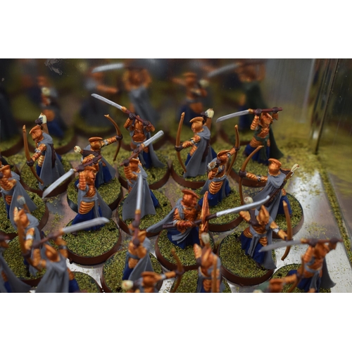 493 - A collection of cast metal war-games and miniature figures by 'Games Workshop' from the 'Lord of The... 