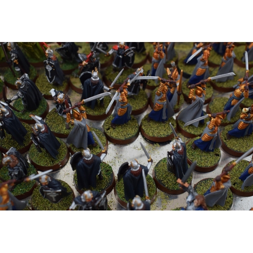 493 - A collection of cast metal war-games and miniature figures by 'Games Workshop' from the 'Lord of The... 