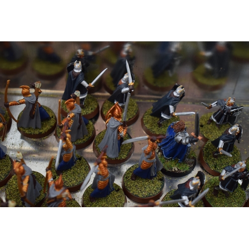 493 - A collection of cast metal war-games and miniature figures by 'Games Workshop' from the 'Lord of The... 