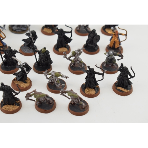 494 - A collection of cast metal war-games and miniature figures by 'Games Workshop' from the 'Lord of The... 