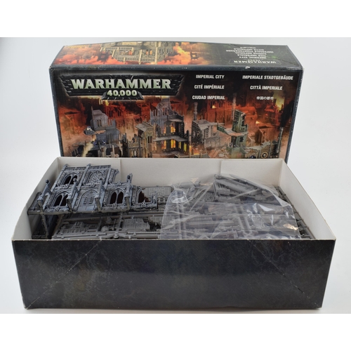 495 - Boxed Warhammer 40,000 Imperial City. Mostly unbuilt with part that is built proffesionally painted ... 