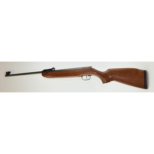 509 - A .177 calibre air rifle by WEIHRAUCH made in Germany. Length 100cm. Together with canvas gun slip.