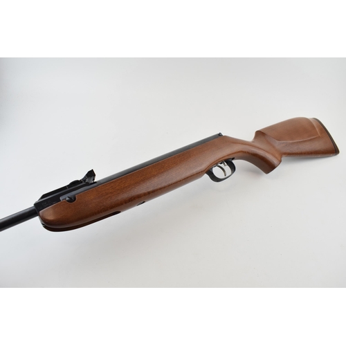 509 - A .177 calibre air rifle by WEIHRAUCH made in Germany. Length 100cm. Together with canvas gun slip.