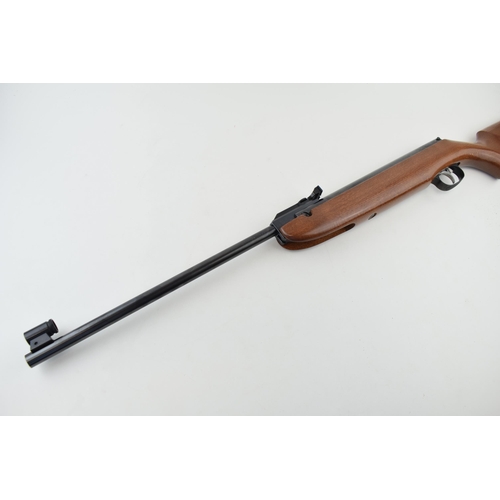 509 - A .177 calibre air rifle by WEIHRAUCH made in Germany. Length 100cm. Together with canvas gun slip.